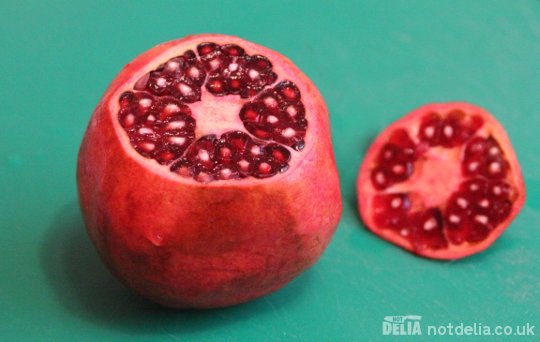 A topped and tailed pomegranate