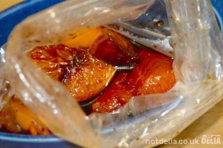 Salmon fillet in a plastic bag with orange, honey and soy sauce marinade