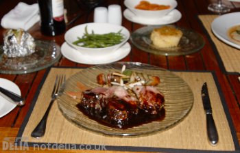 Rack of lamb, done pink, with skewers of grilled vegetables