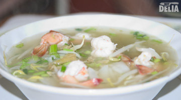 A bowl of prawn noodle soup